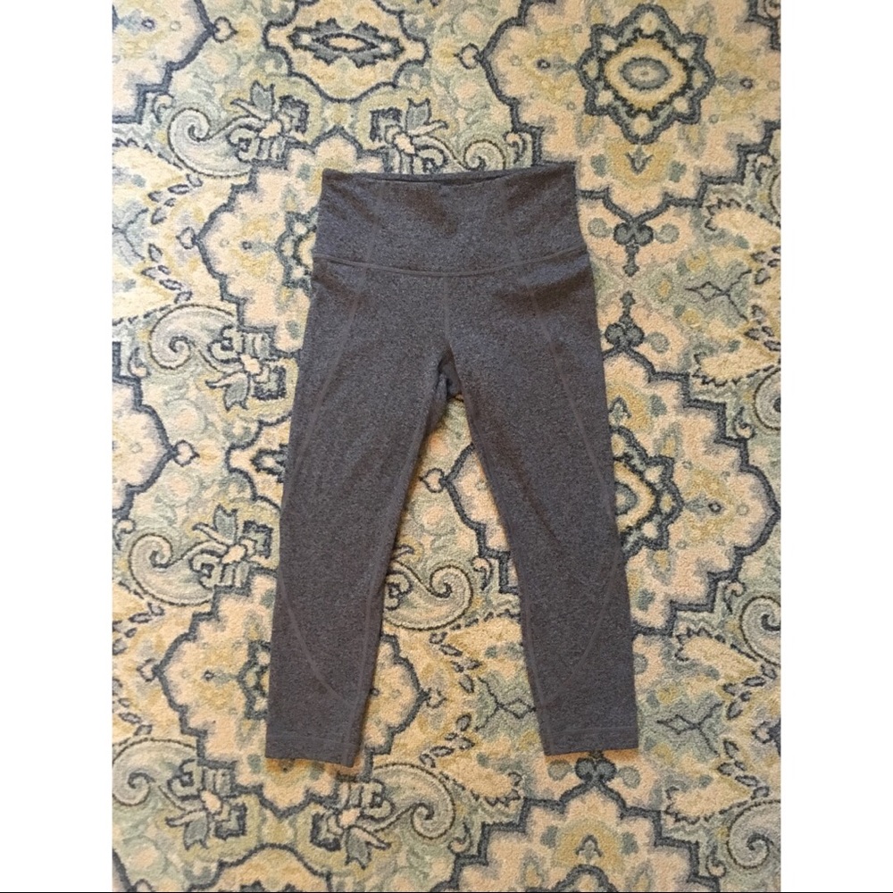 TWO pairs of Athleta Salutation Capri leggings